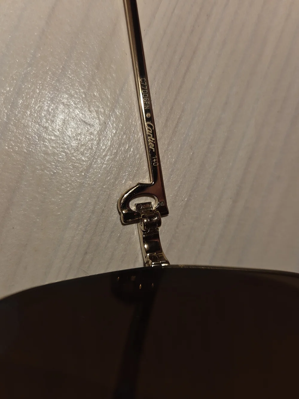 Cartier Gold Frame Sunglasses with Dark Gray Lenses